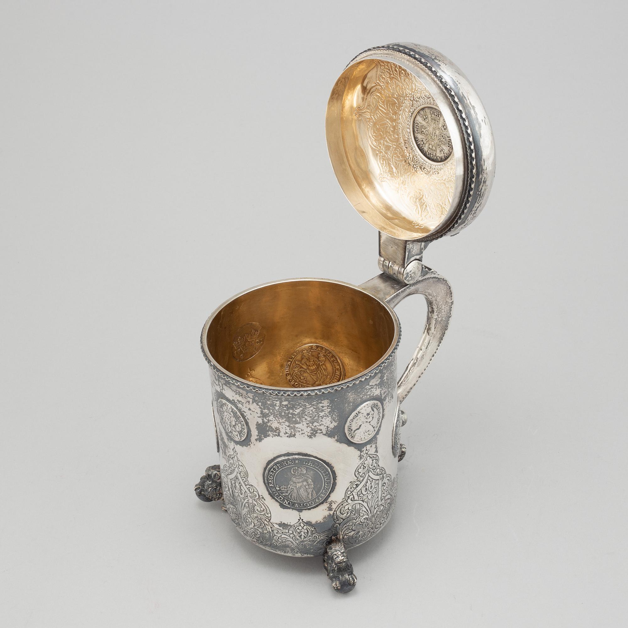 A parcel-gilt silver baroque style tankard.
