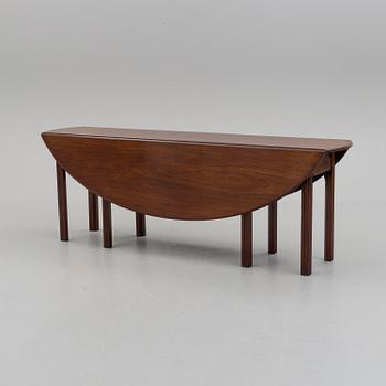 A DINING TABLE, England, made for NK, Nordiska Kompaniet, Sweden. Signed with label. Probably 1960s / 70s.