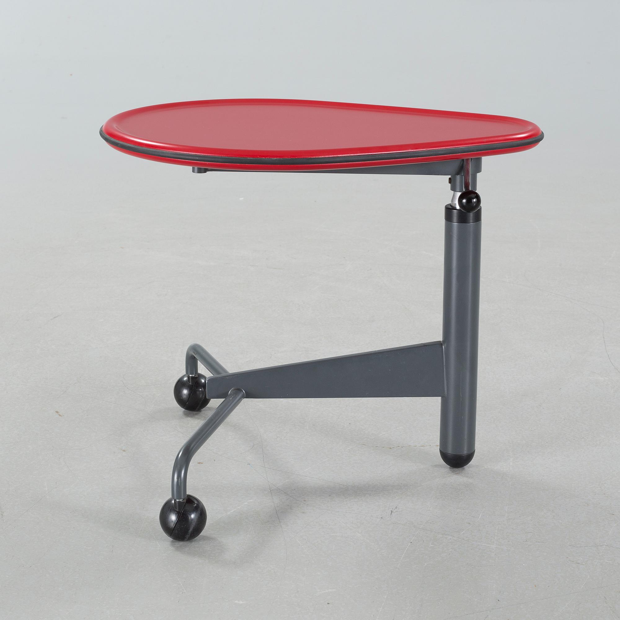A "Kick" table, designed by Toshiyuki Kita for Cassina, model launched 1983.