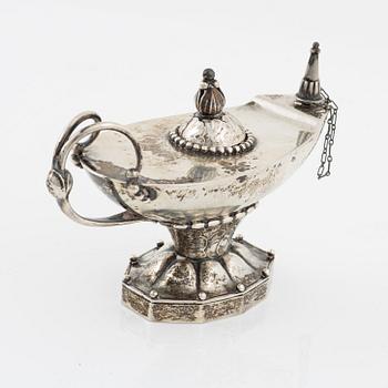 Georg Jensen, an 830/1000 silver table lighter in the shape of an oil lamp, Copenhagen 1915-1919. Design number 12.