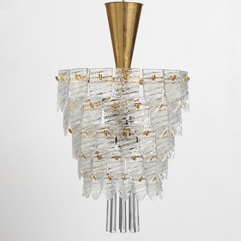 GUNNAR CYRÉN, a glass and gilt bronze chandelier, Orrefors, Sweden 1960's.