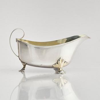 A Swedish early 19th century parcel-gilt cream-jug, mark of Johan Wasserman, Lindesberg, Sweden 1810.