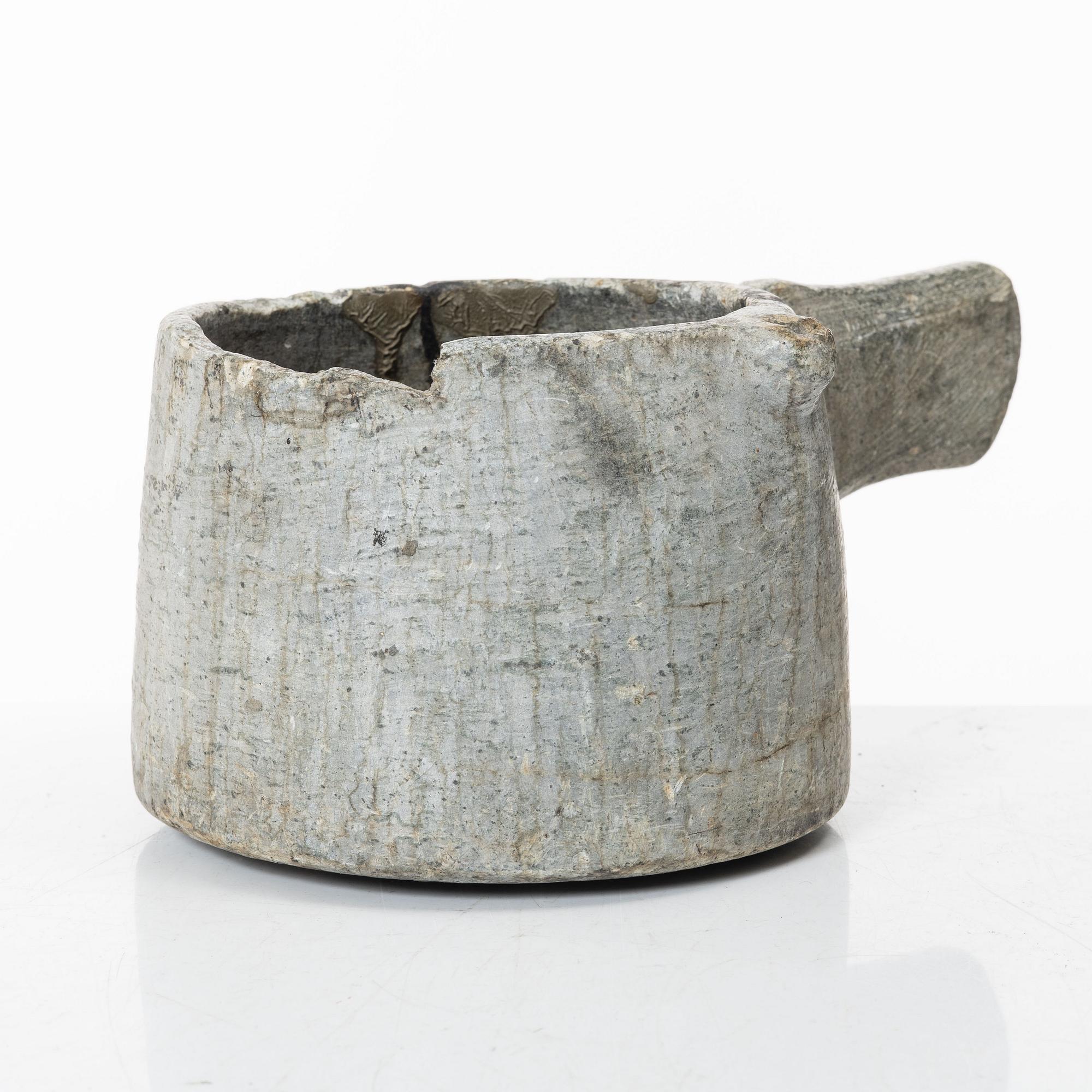A Swedish carved soapstone jug, 19th century.