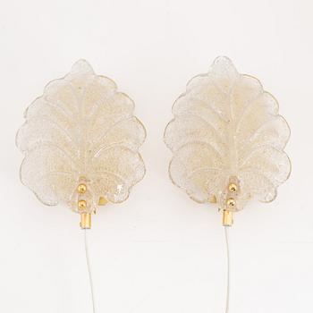 A pair of brass and glass wall lamps, Rejmyre Armaturfabrik, second half of the 20th century.
