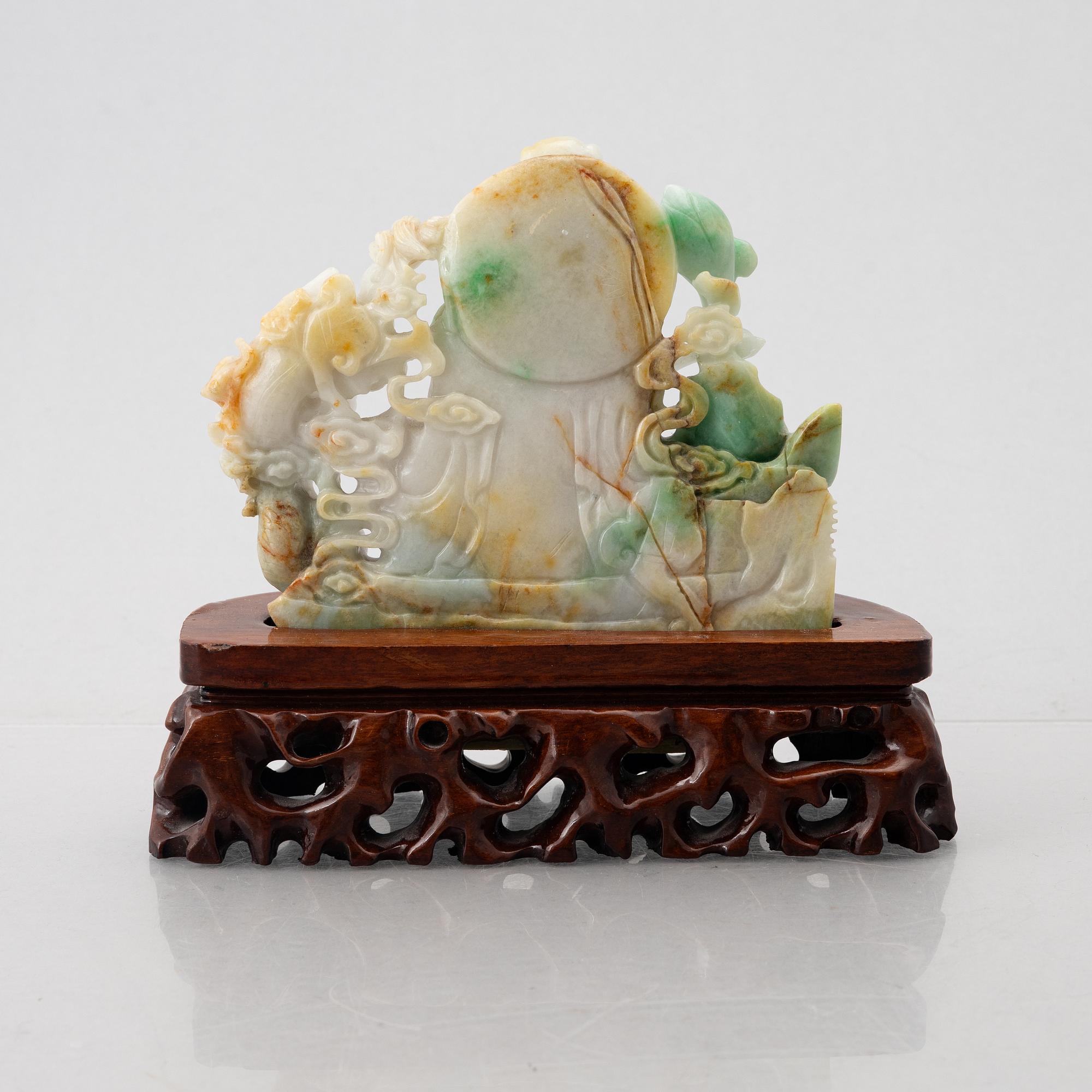 A Chinese stone figure of a Guanyin, later part of the 20th century.