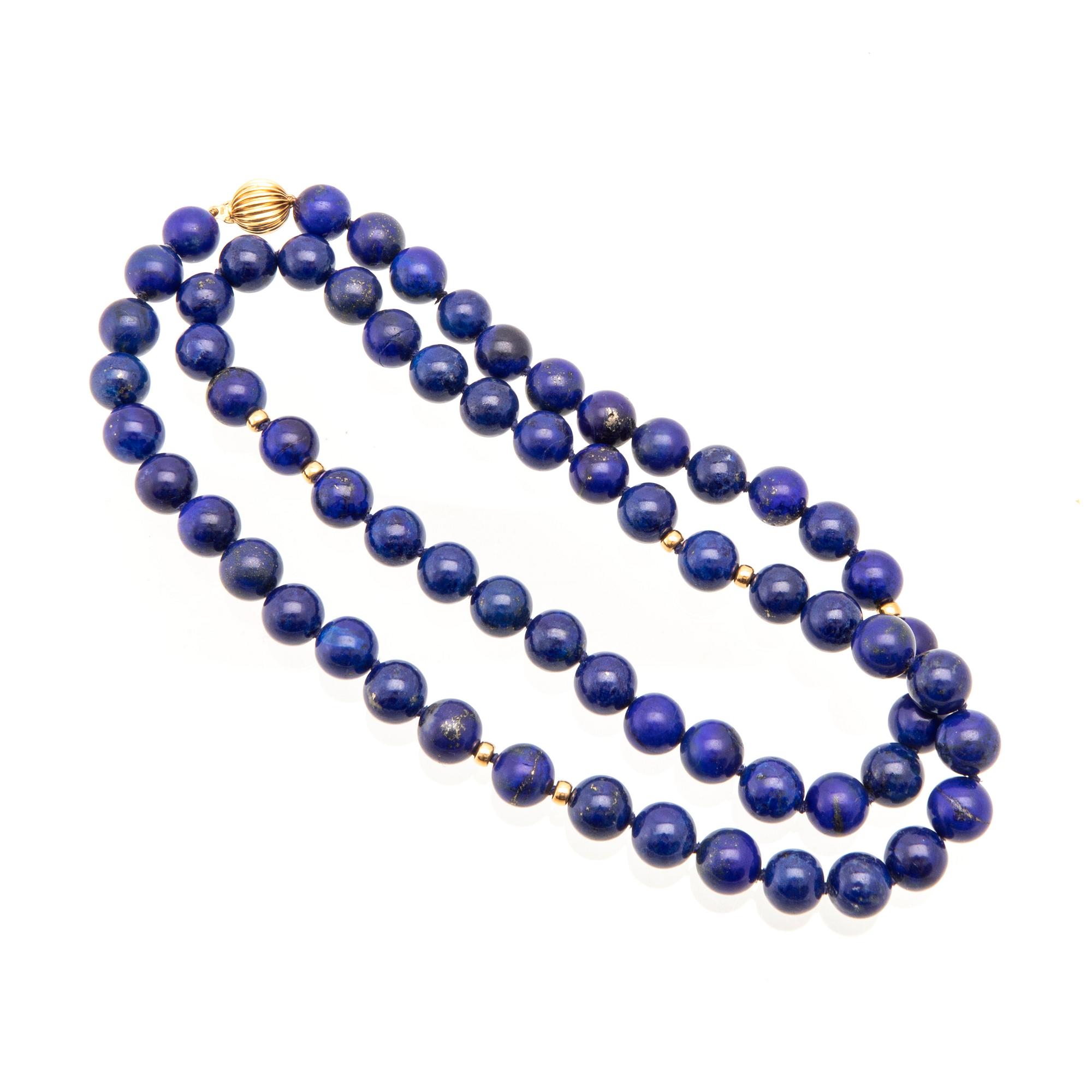 Halsband lås 18K guld och kulor av Lapis Lazuli.