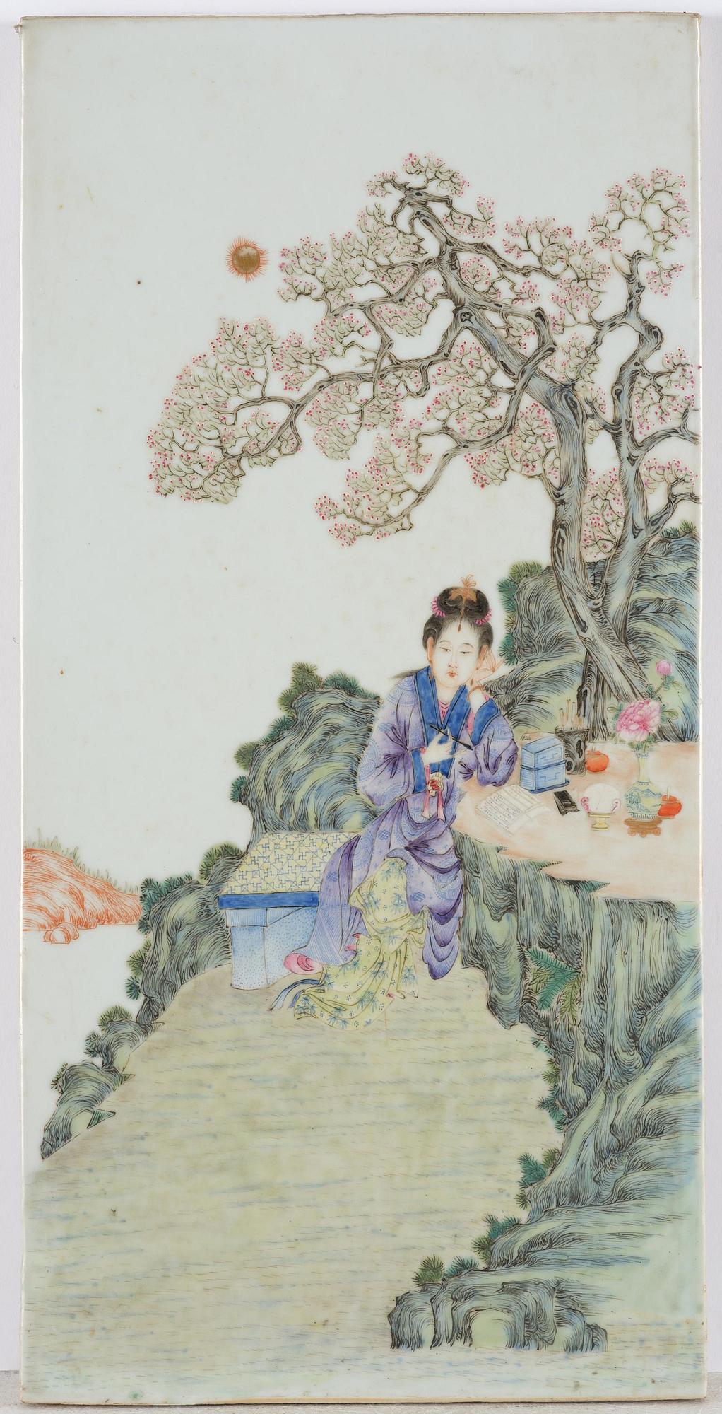 A set with four Chinese porcelain panels with a wooden frame, first half of 20th century.