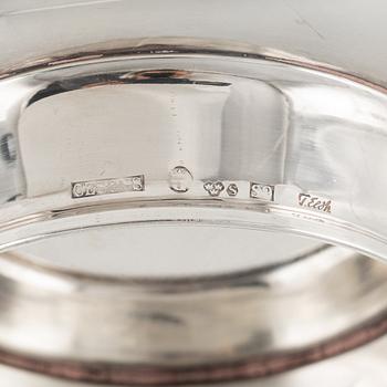 A silver vase and two bowls, Sweden, 1961-76.