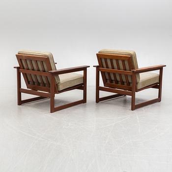 A 1960' walnut sofa with two easy chairs by Ikea.