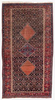 A semi-antique Bidjar rug, c. 255 x 135 cm.