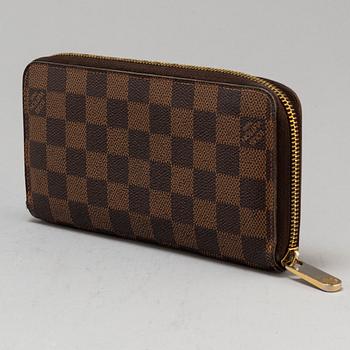 LOUIS VUITTON, a Damier Ebéne wallet.