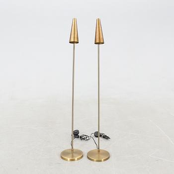 Floor lamps, a pair from House Doctor, Denmark, 21st century.