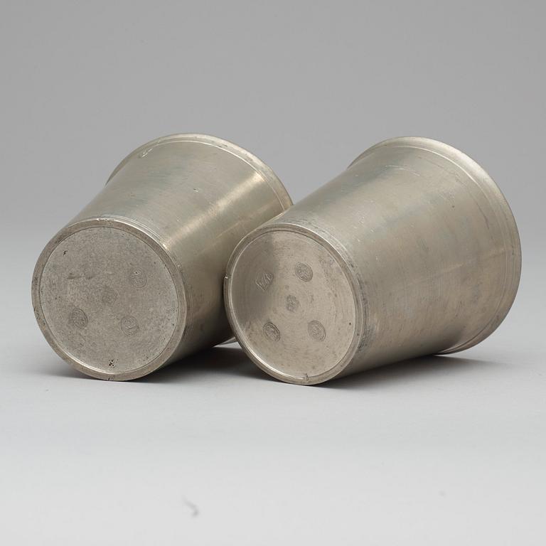 A pair of pewter cups by M Rundquist 1826.