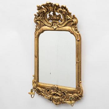 A Swedish rococo two-branch girandole mirror, Stockholm, later part 18th century.