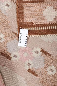 Ingegerd Silow, a flat weave runner carpet, signed IS, c. 262 x 82 cm.