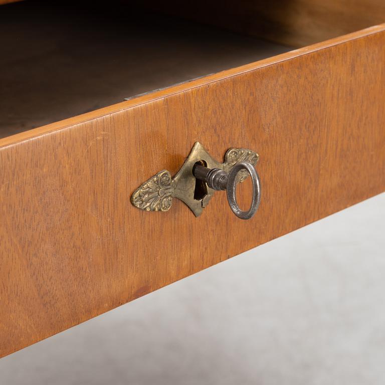 An mahogany veneered Empire style library table by Lorentz Wilhelm Lundelius Stockholm 1818-1857.