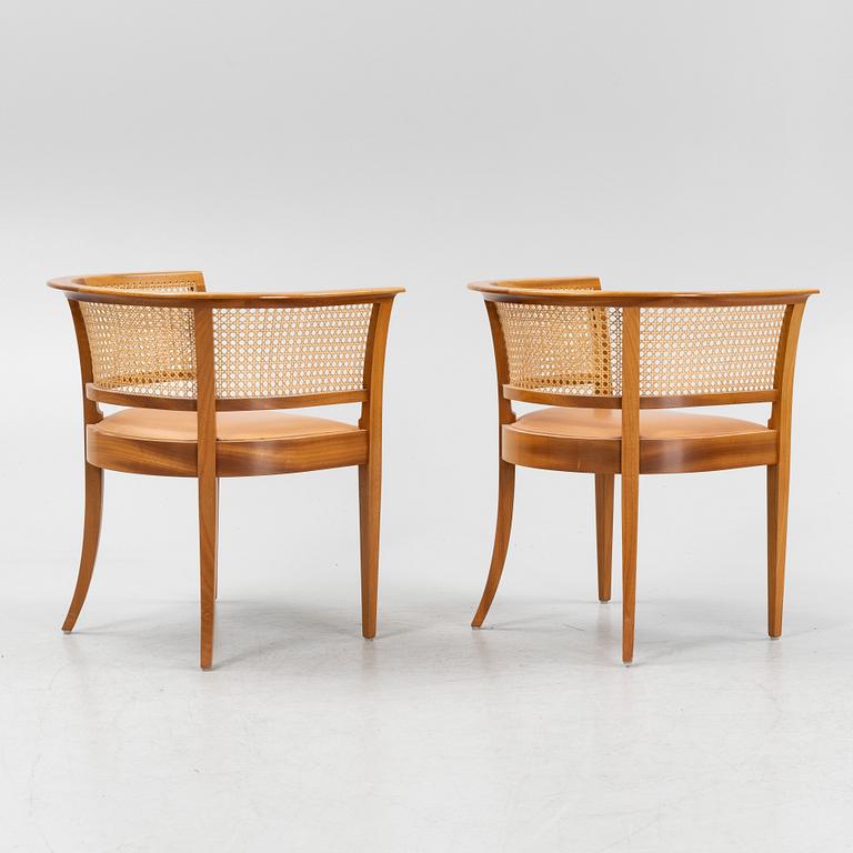 Kaare Klint, a pair of mahogany and natural leather 'Fabourg Chairs', Rud. Rasmussen, Denmark, late 20th Century. .