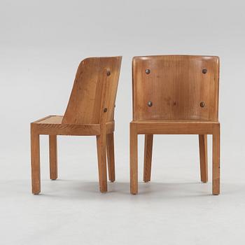 A pair of Axel Einar Hjorth 'Lovö' stained pine armchairs, Nordiska Kompaniet, Sweden 1930's.