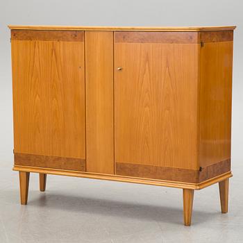 A elm and burr birch veneered Swedish Modern cabinet, 1930's/40's.