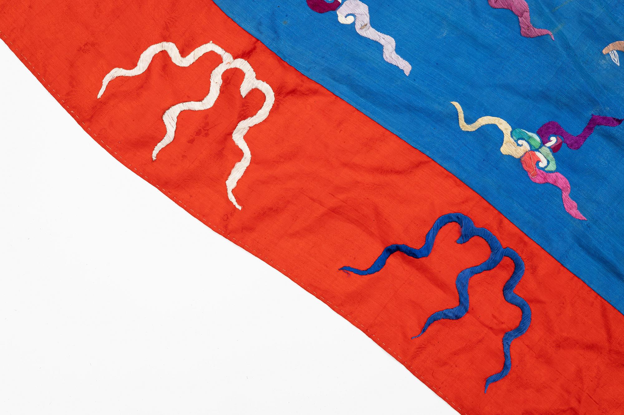 A Chinese embroidered triangular silk banner, late Qing dynasty/possibly early 20th century.