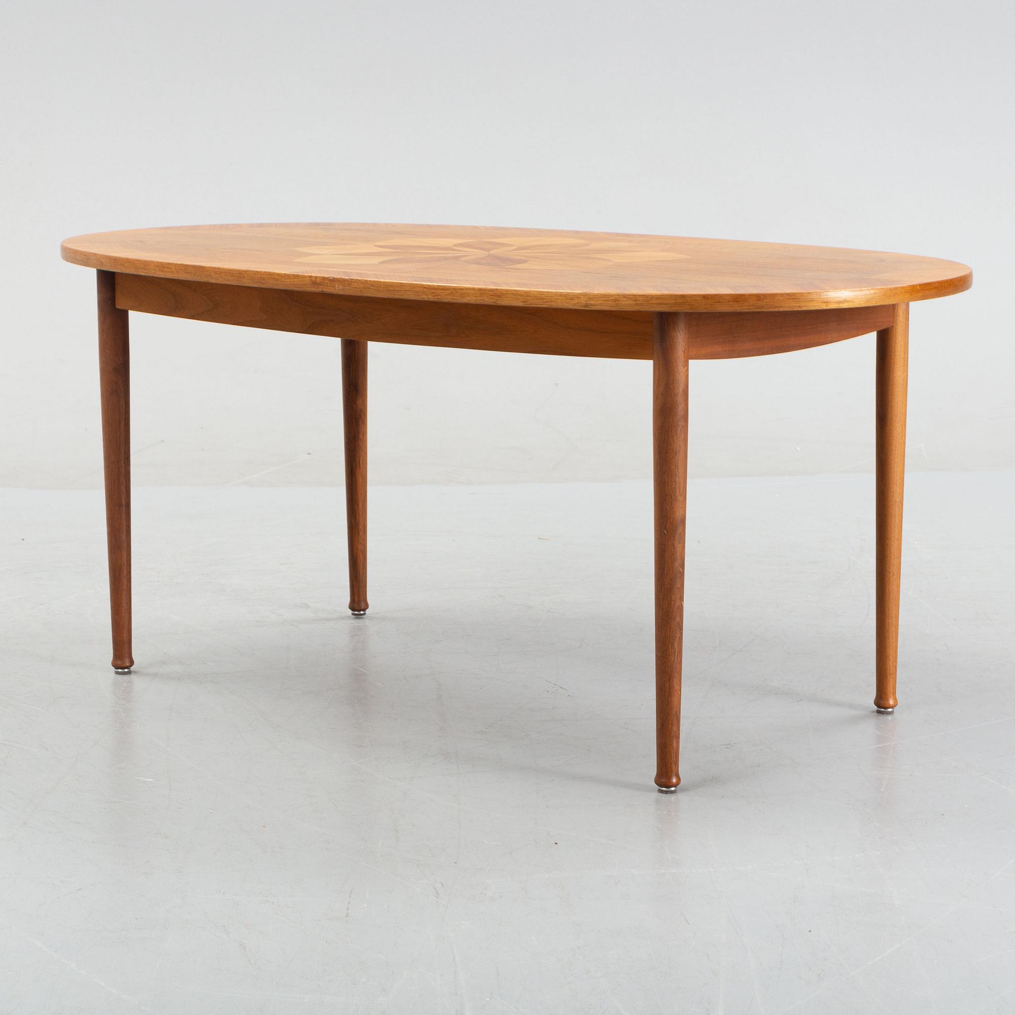 A walnut veneered coffee table from Seffle Möbelfabrik, mid 20th Century.