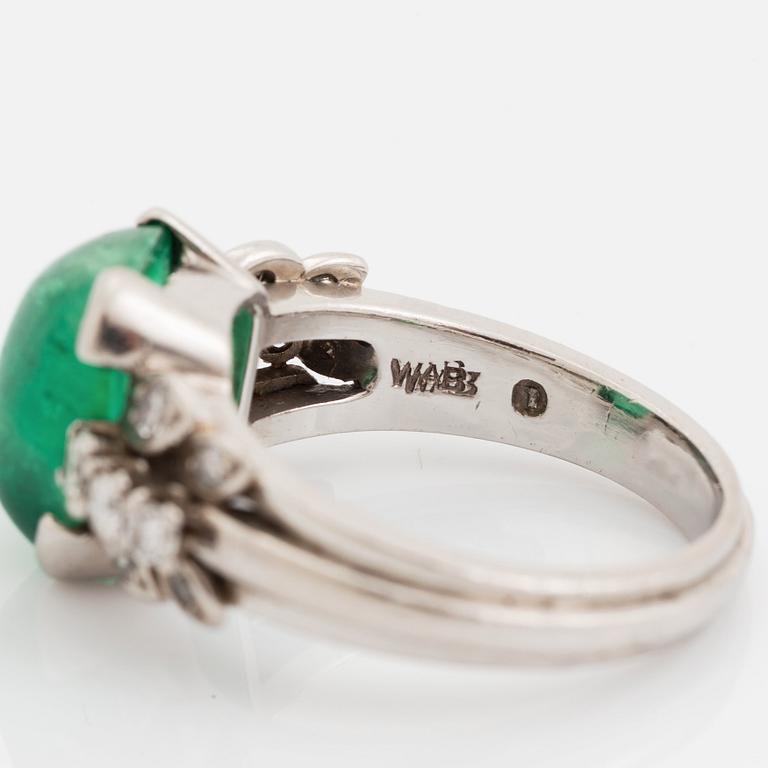 A WA Bolin 18K white gold ring set with a cabochon-cut emerald.