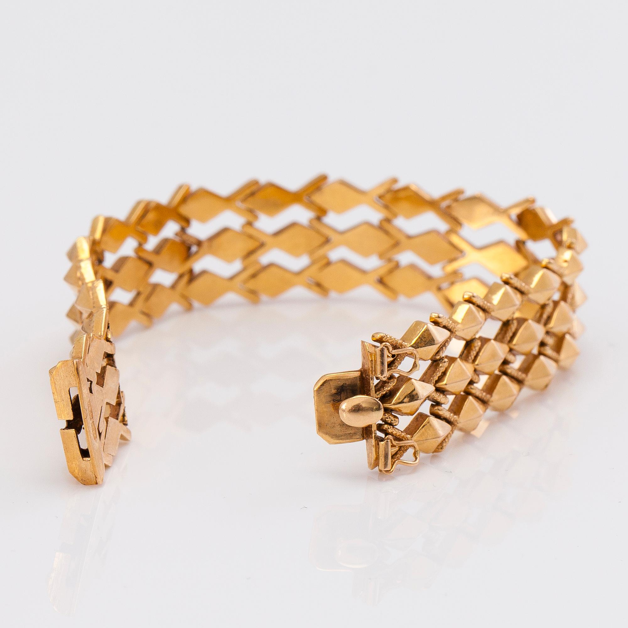 A 14K gold bracelet.