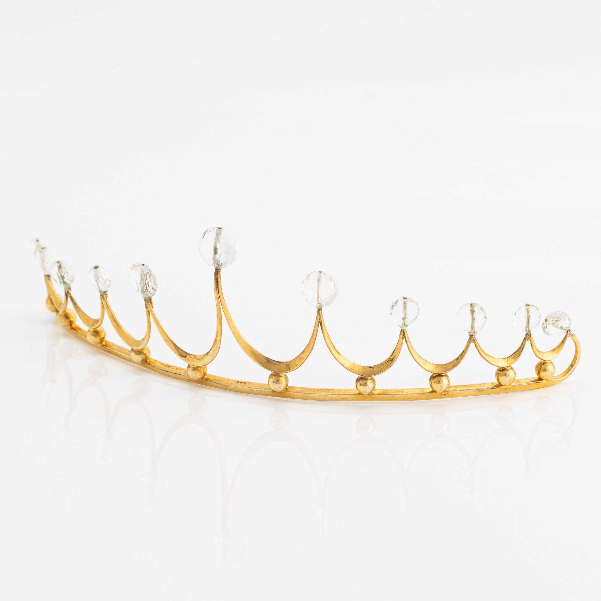 Tiara, gilded silver with faceted white topazes.