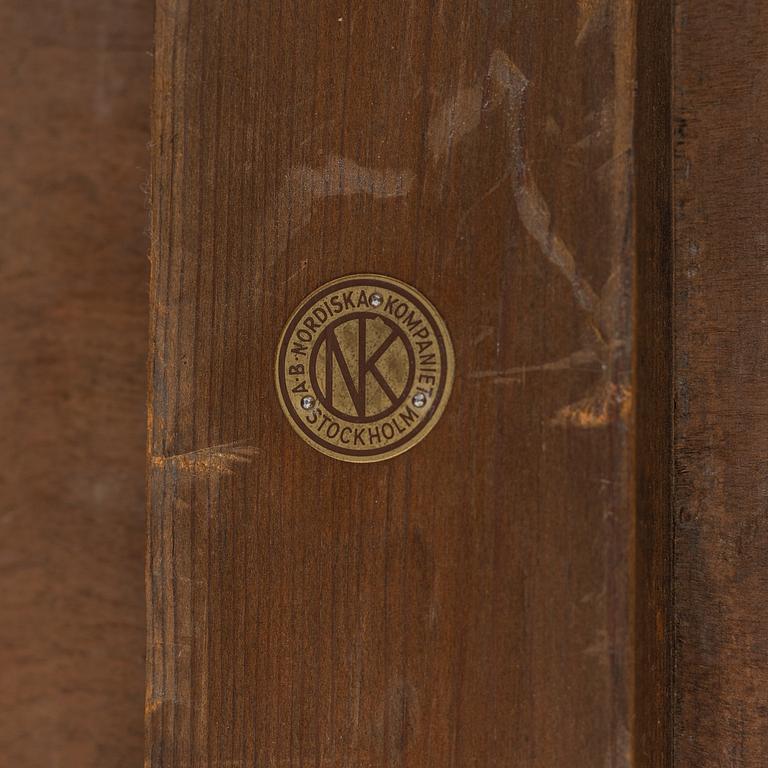 Axel Einar Hjorth, attributed to. A walnut and birch desk, Nordiska Kompaniet, 1930's.