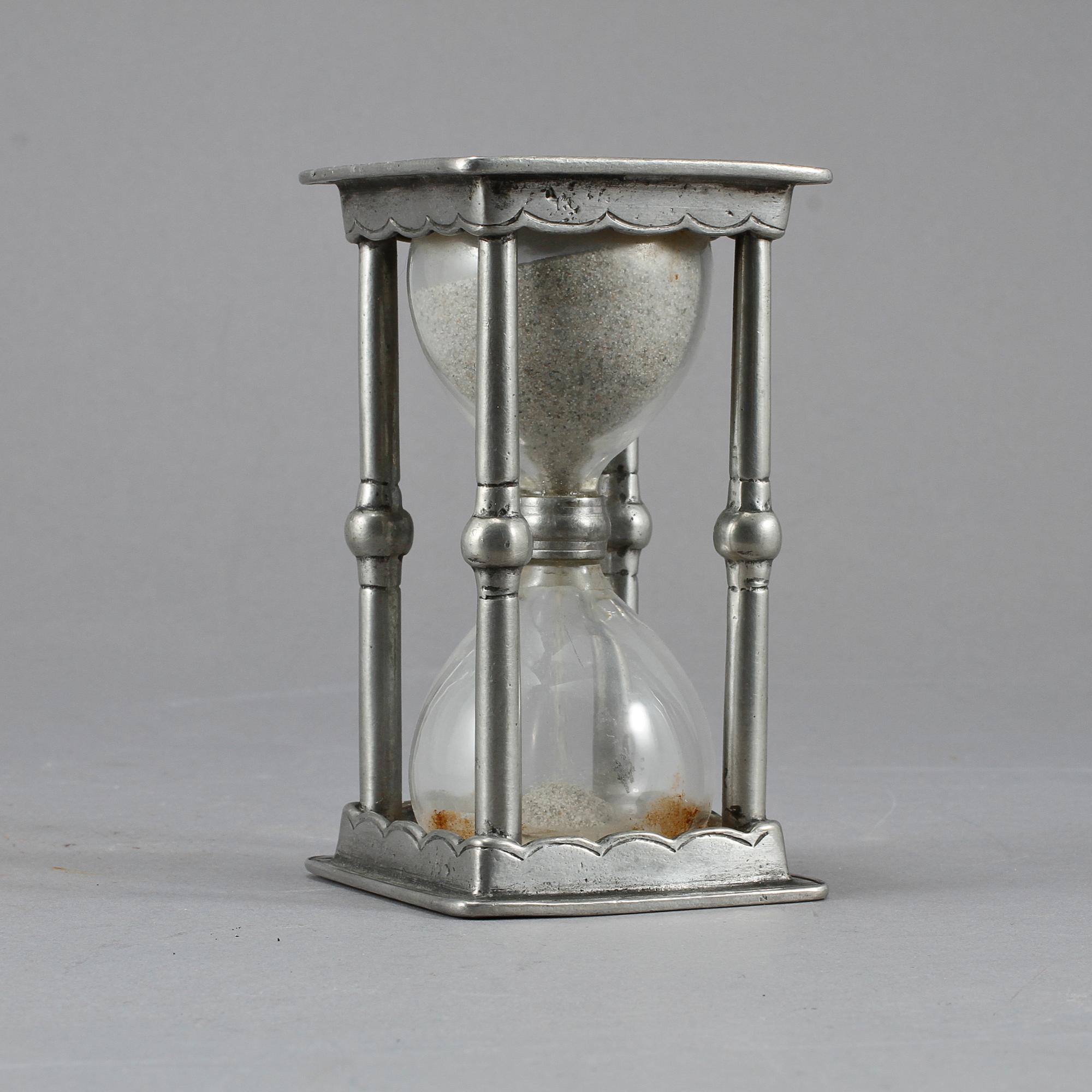 TIMGLAS, vitemetall och glas, 1900-tal.