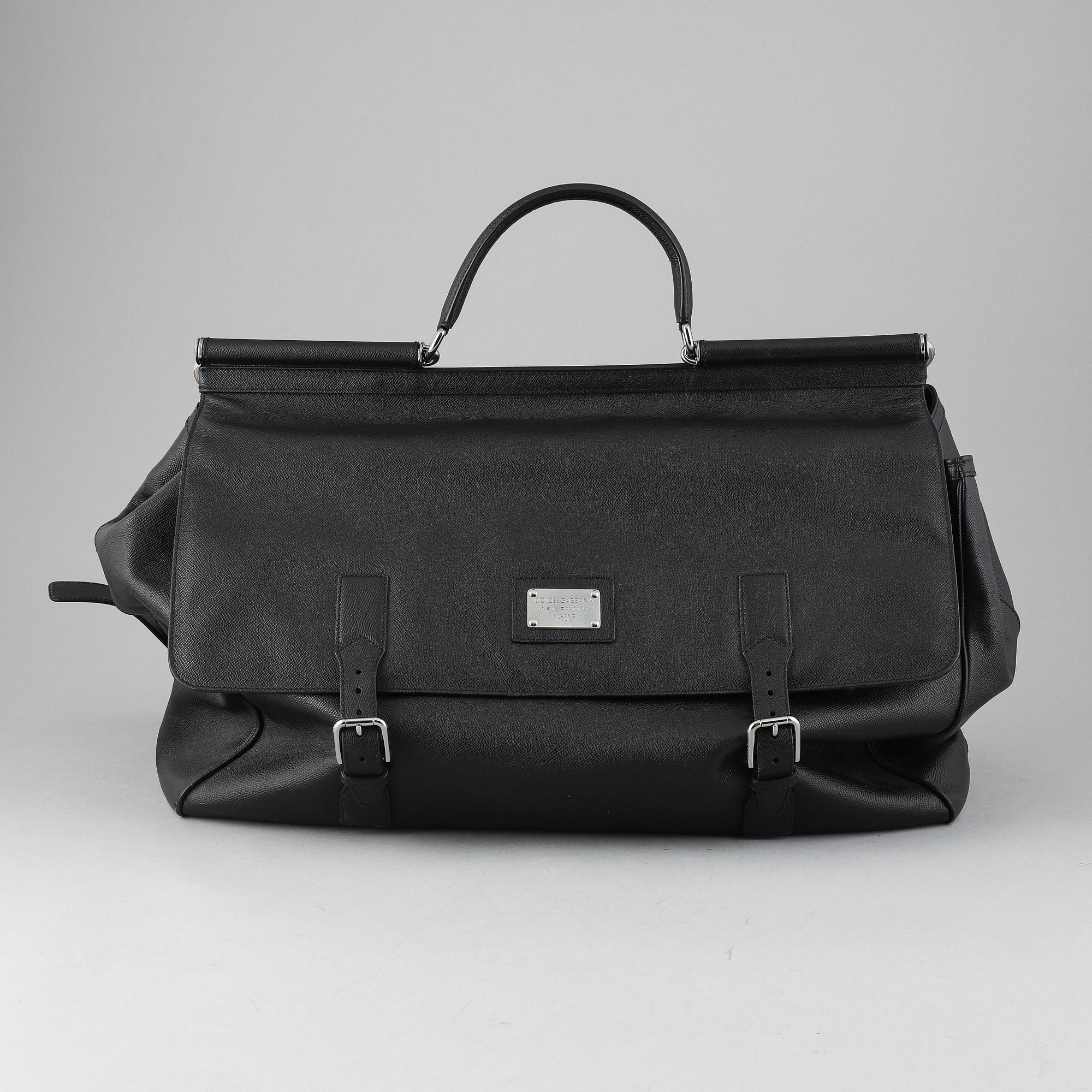 Dolce & Gabbana, a black leather weekend bag.