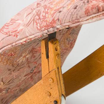Ilmari Tapiovaara, an early 1960s 'Dolphin chair' for Skanno.