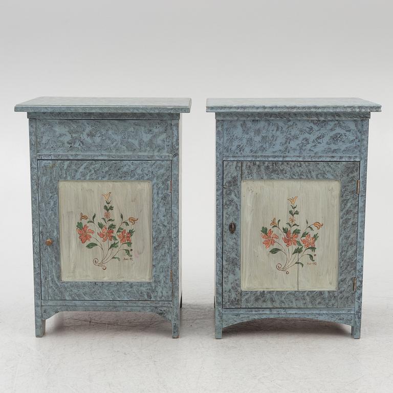 A matched pair of bedside tables, 20th century.