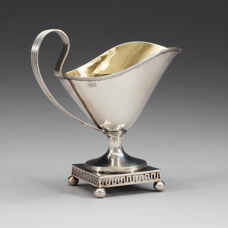 A Swedish early 19th century parcel-gilt cream-jug, makers mark of Arvid Floberg, Stockholm 1800.