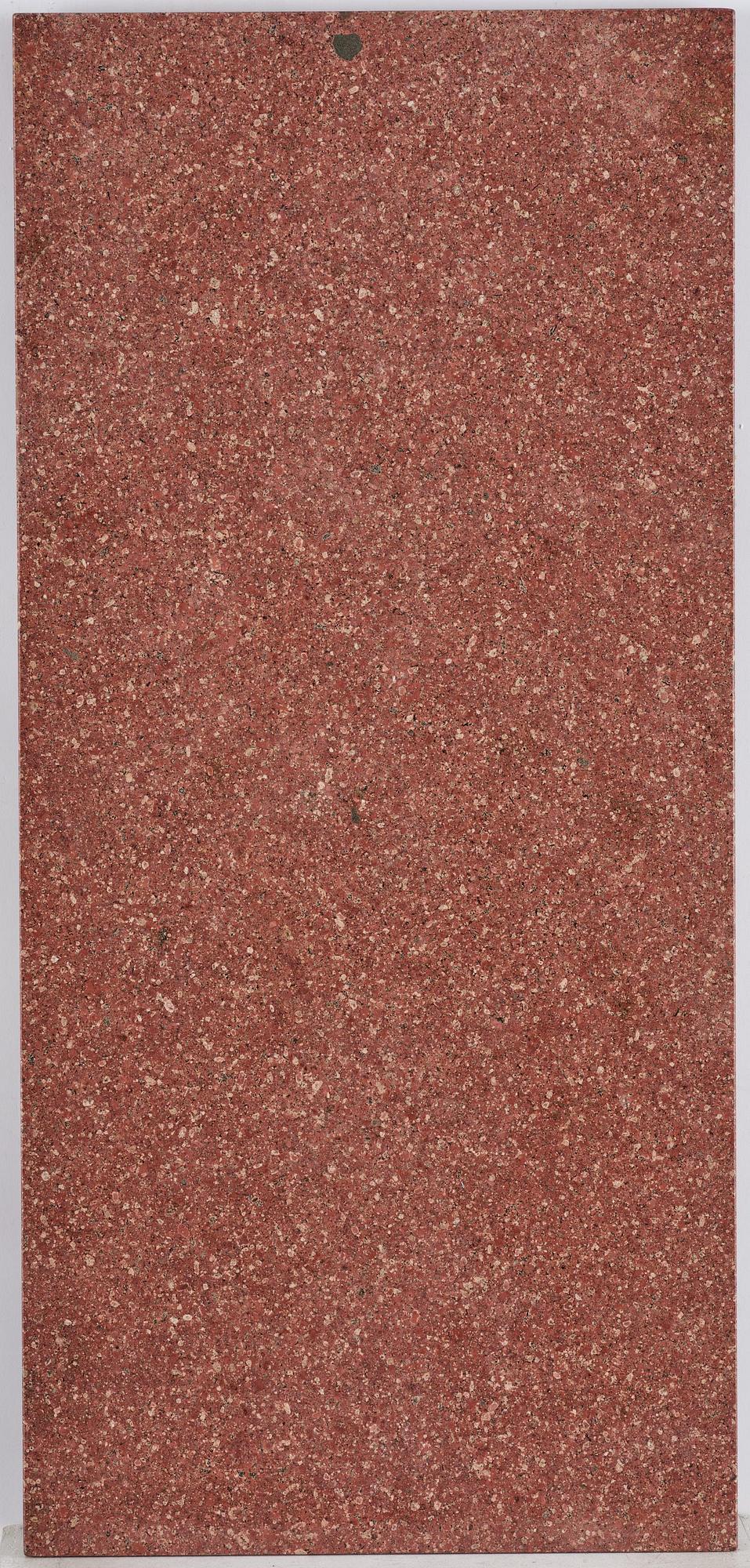 A table with granite stone top from Älvdalen, first part 19th century on a later metal stand.