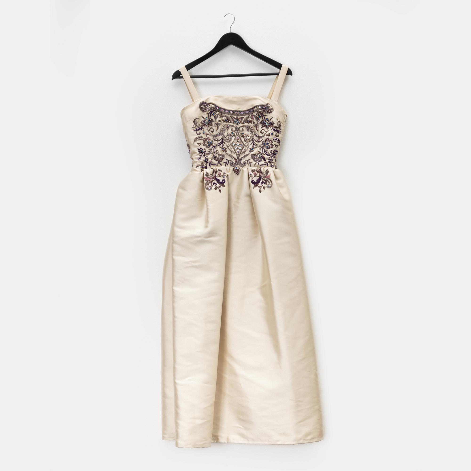 Jeanne Lanvin, A 1950's Antonio del Castillo pearl embroidered dress.