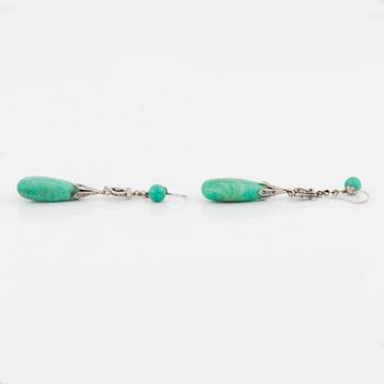 A pair of platinum earrings with amazonite.