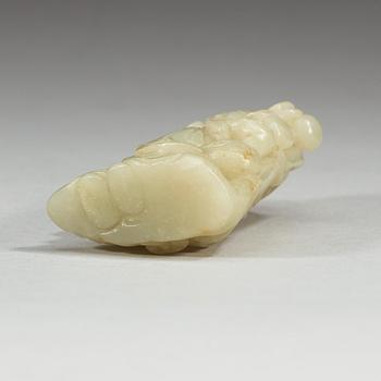 A nephrite figurine of a lady with a duck, Qing Dynasty (1644-1912).
