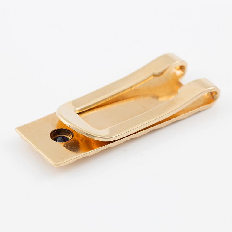 Billfold, 14K gold with sapphire.