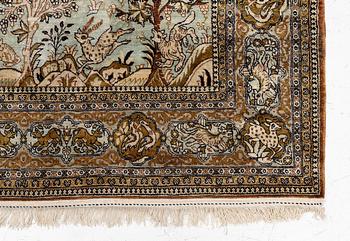 A Ghom, figural, silk rug, c. 205 x 140 cm.
