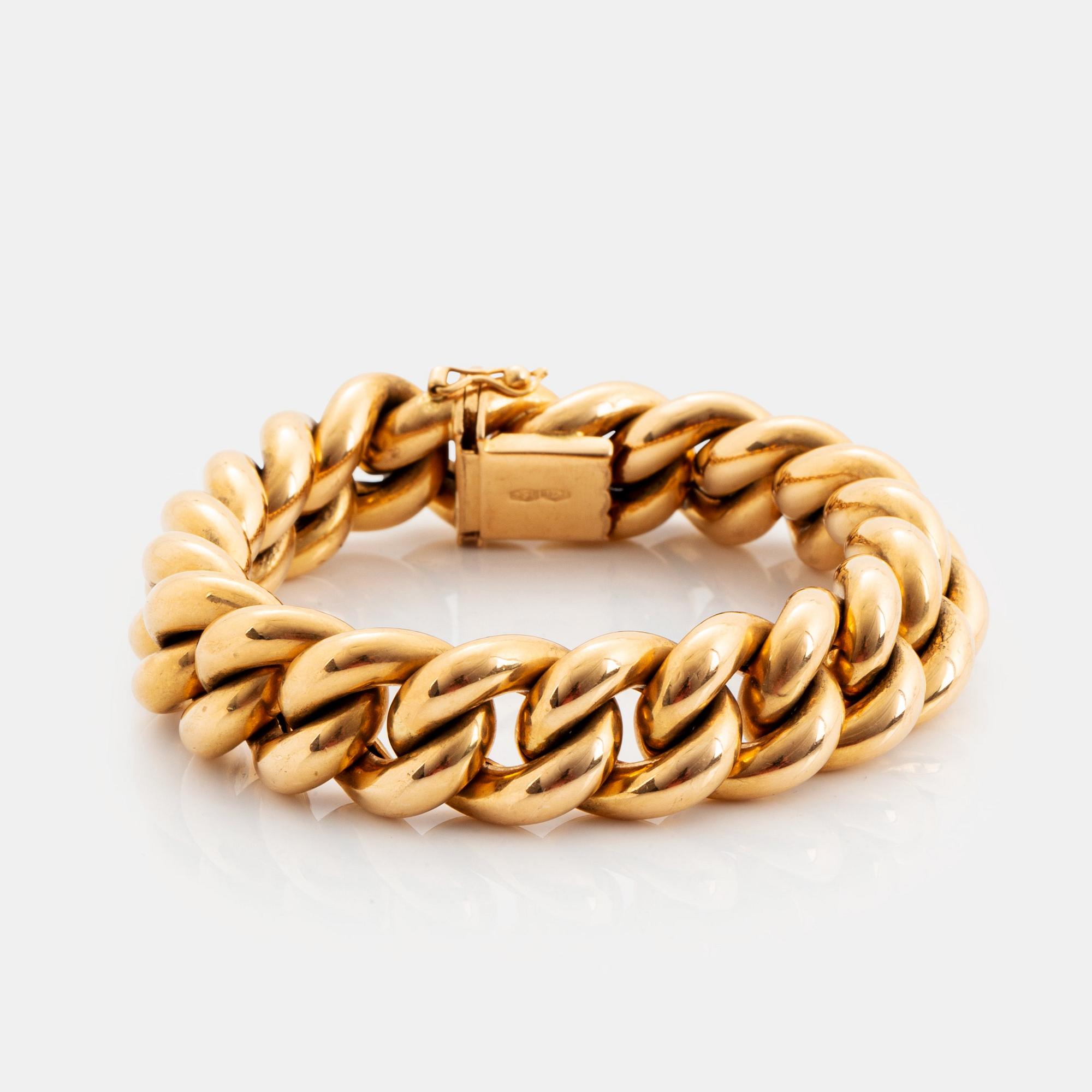 An 18K gold bracelet.