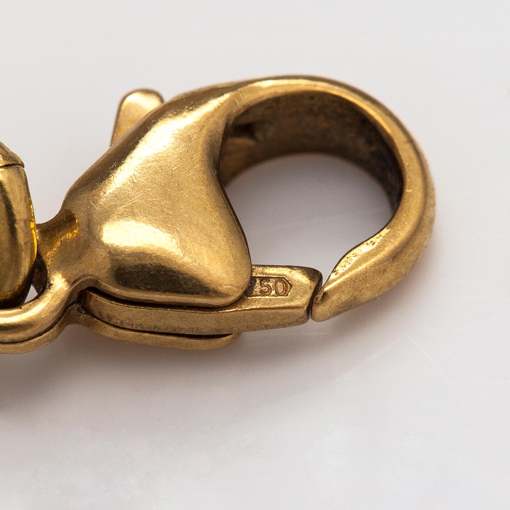 An 18K gold bracelet "Moose head". Kalevala Koru, Helsinki 1999.