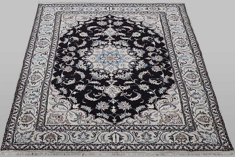 A carpet, Nain, part silk, ca 9 laa, ca 290 x 194 cm.