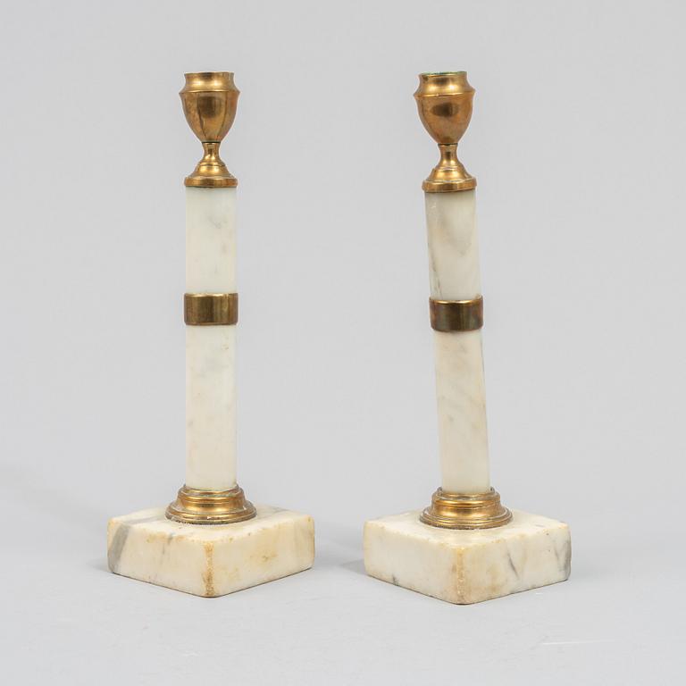 A pair of Gustavian style candelsticks, 13th/20th century.