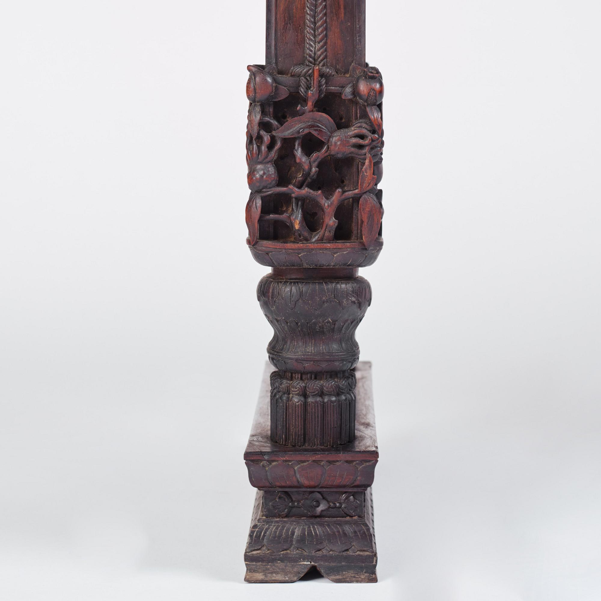 A massive zitan recessed-leg long table 'Jiaotousun Qiotouan', Qing dynasty, 19th century.