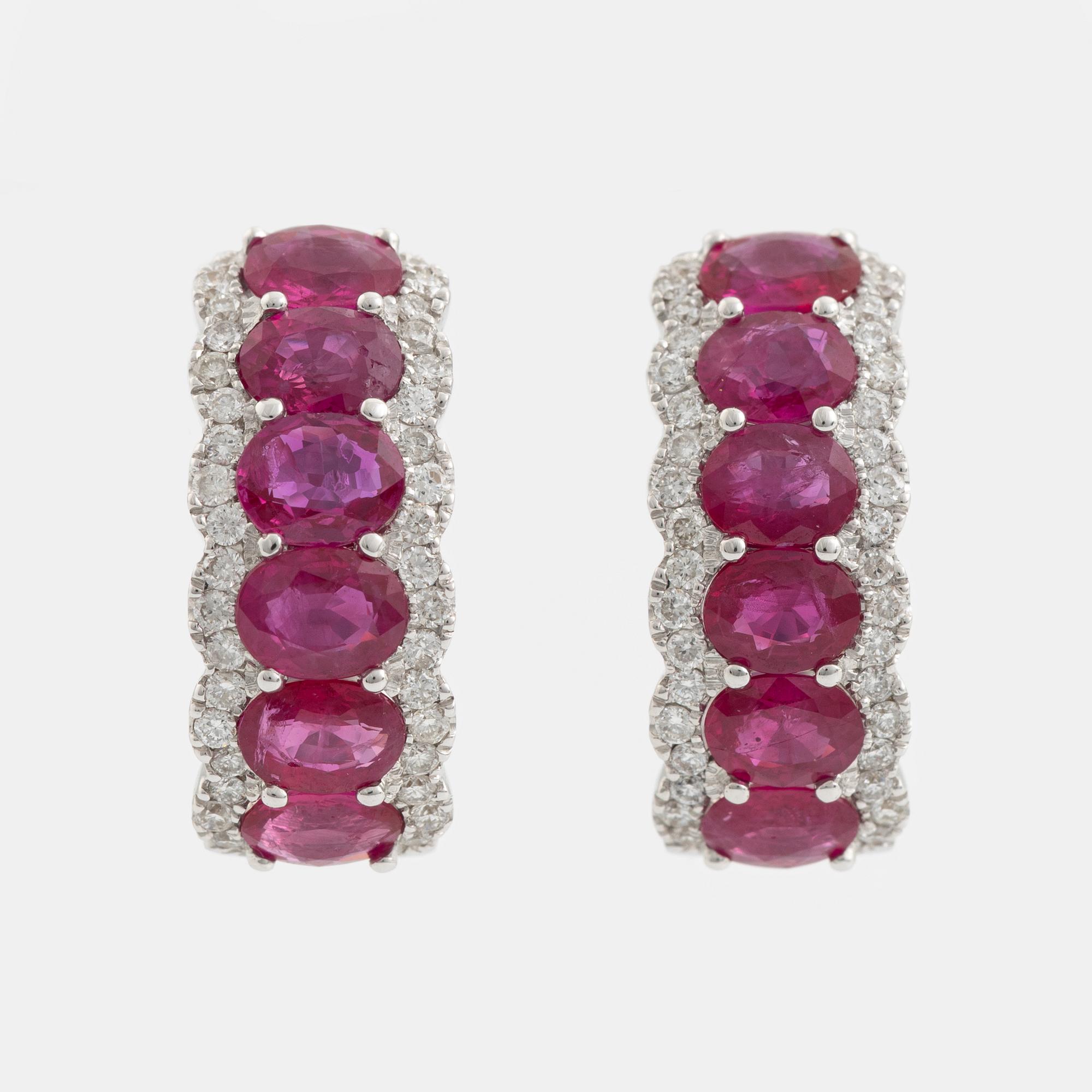 Earrings with rubies and brilliant-cut diamonds.