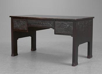 A Swedish black lacquered Art Noveau oak desk.