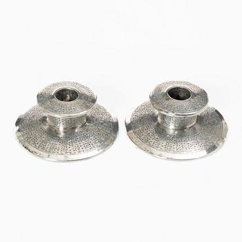 Two pairs of Persian silver candle holders, 20th century.