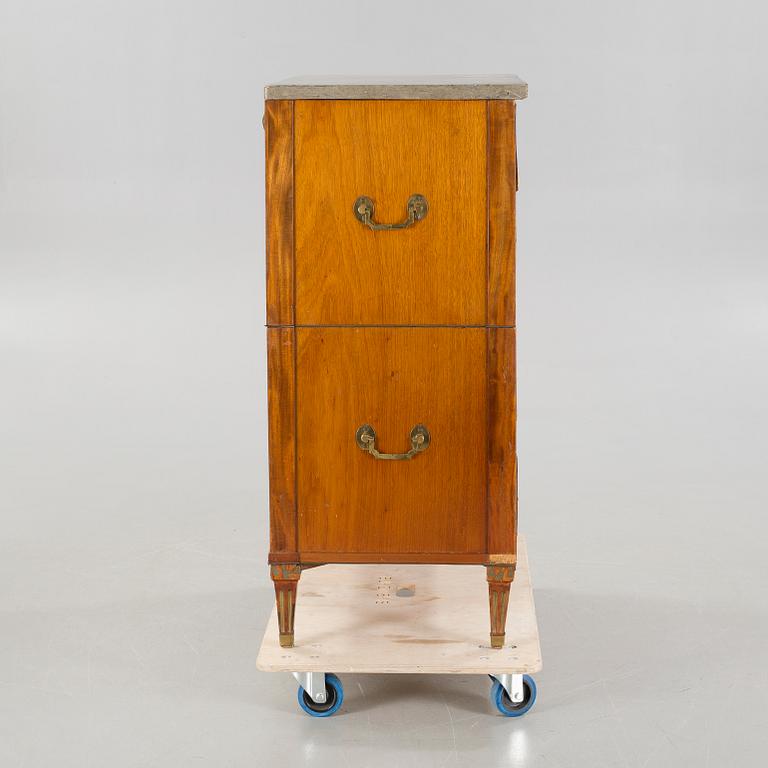 A late gustavian chest of drawers, around the year 1800.