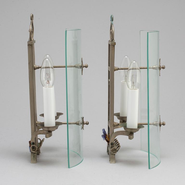 A pair of pewter wall lamps, 1920s.
